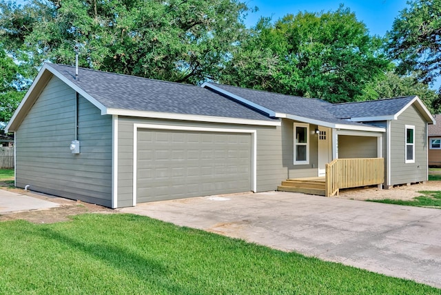 ranch-style house with a porch, a garage, and a front lawn