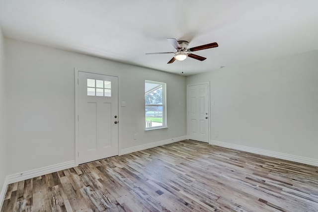 entrance foyer with light hardwood / wood-style floors and ceiling fan