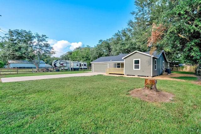 exterior space with a front lawn and a garage