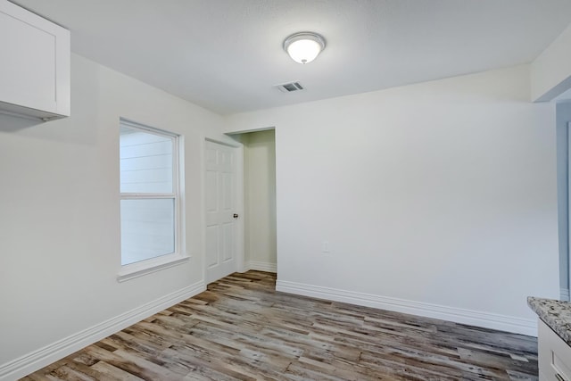 unfurnished room featuring light wood-type flooring