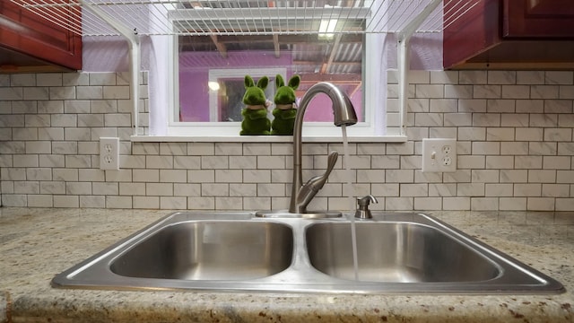 kitchen with sink and backsplash