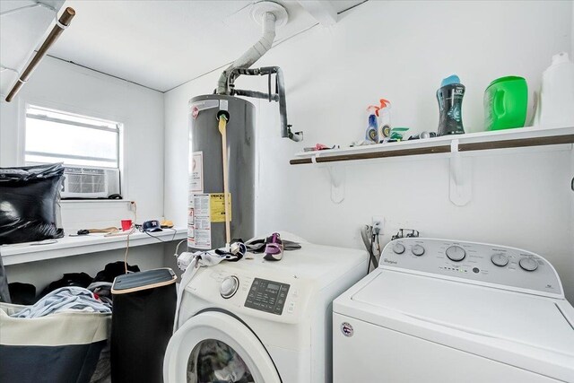 laundry area featuring washer and clothes dryer, cooling unit, and water heater