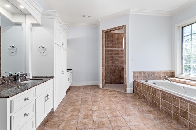 bathroom featuring tile patterned flooring, vanity, ornamental molding, and independent shower and bath