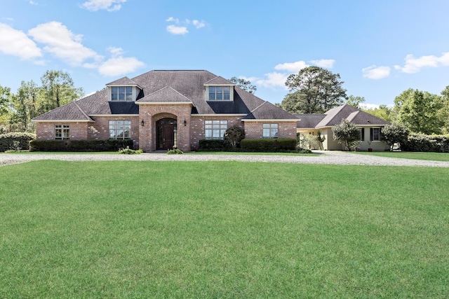 view of front of property with a front lawn