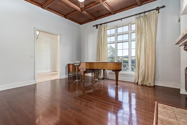 misc room featuring dark wood-type flooring, beamed ceiling, wood ceiling, and coffered ceiling