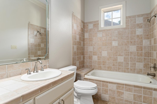 full bathroom featuring vanity, toilet, and tiled shower / bath combo