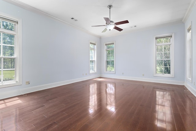 empty room with dark hardwood / wood-style flooring, ceiling fan, and ornamental molding