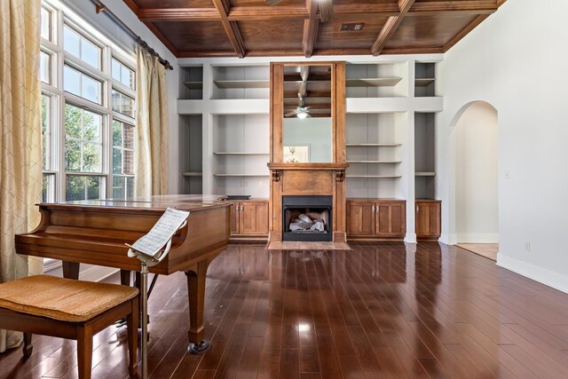 miscellaneous room featuring built in features, coffered ceiling, and wood ceiling