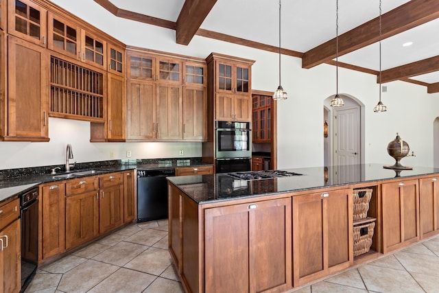 kitchen featuring beamed ceiling, dishwasher, pendant lighting, and sink