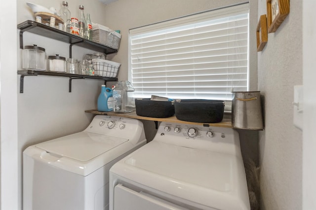 laundry room with independent washer and dryer