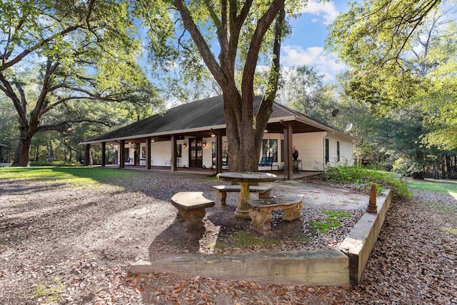 exterior space featuring covered porch