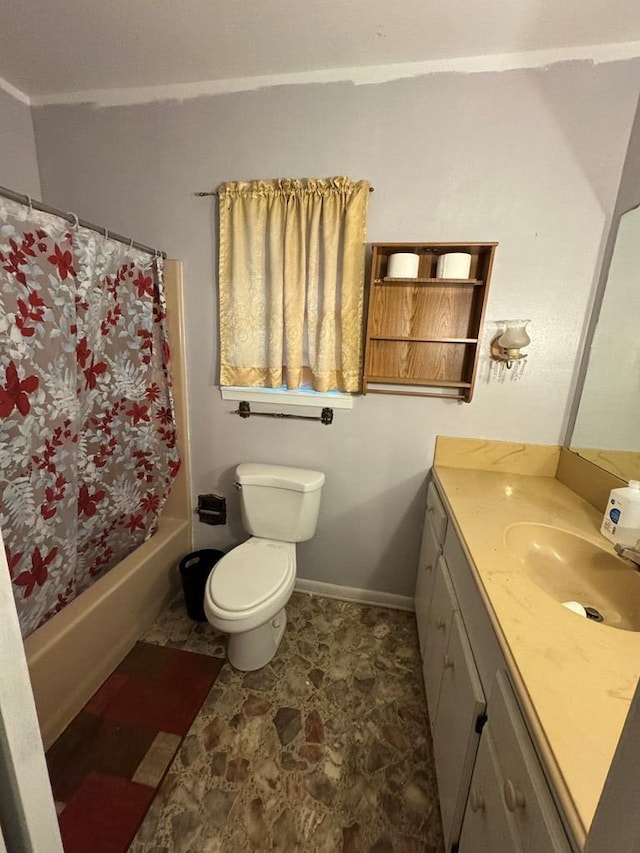 full bathroom with shower / bath combo with shower curtain, vanity, and toilet