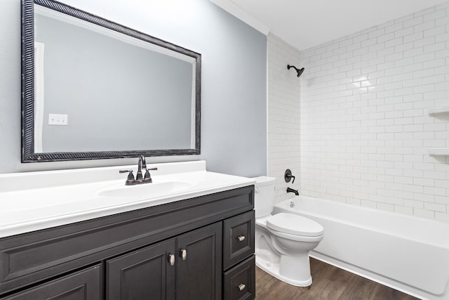 12795 Tanoak Ln, Beaumont, TX 77713 - full bathroom with vanity, wood finished floors, and tub / shower combination