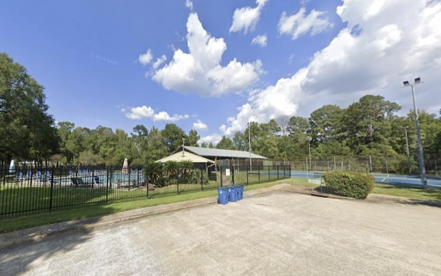 12795 Tanoak Ln, Beaumont, TX 77713 - surrounding community featuring view of wooded area