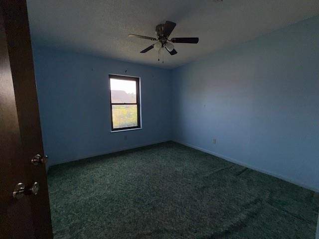 4390 Cartwright St, Beaumont, TX 77707 - carpeted empty room with a ceiling fan