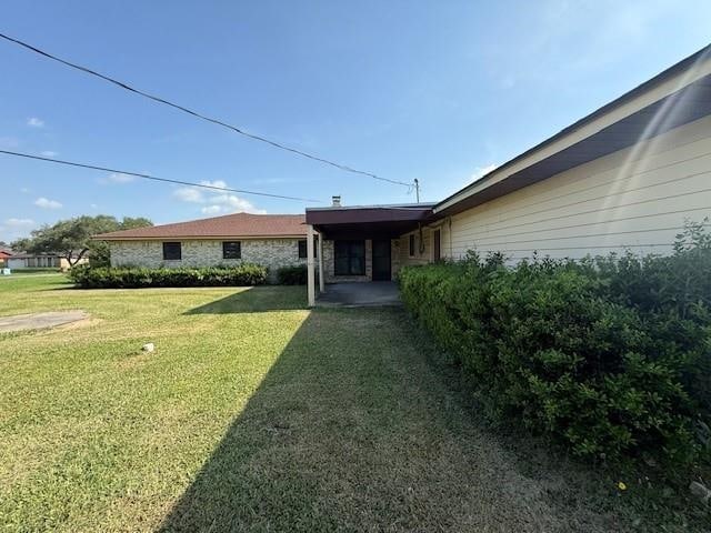 4390 Cartwright St, Beaumont, TX 77707 - view of grassy yard