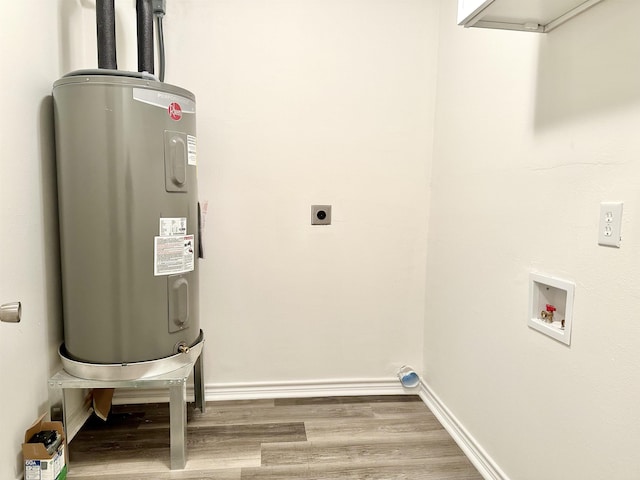 laundry area featuring wood-type flooring, washer hookup, electric dryer hookup, and water heater