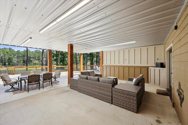 243 Riverbirch, Brookeland, TX 75931 - view of patio with an outdoor living space and outdoor dining space