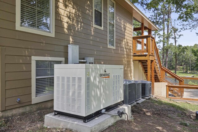 243 Riverbirch, Brookeland, TX 75931 - view of home's exterior featuring stairs and a wooden deck