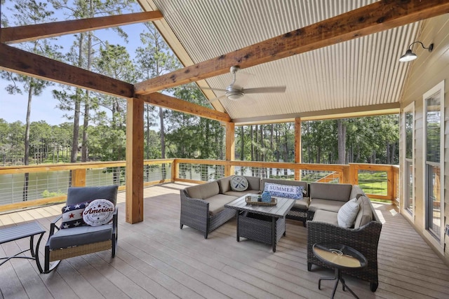 243 Riverbirch, Brookeland, TX 75931 - sunroom / solarium with outdoor lounge area, a ceiling fan, and view of wooded area