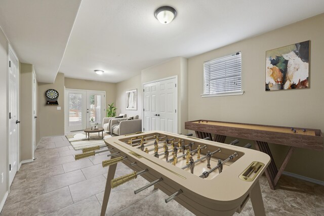 243 Riverbirch, Brookeland, TX 75931 - recreation room featuring french doors and plenty of natural light