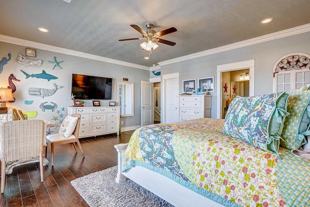 bedroom with connected bathroom, ceiling fan, dark hardwood / wood-style floors, crown molding, and a textured ceiling