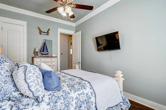 bedroom with ceiling fan, dark hardwood / wood-style flooring, and ornamental molding