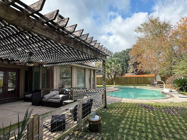 view of swimming pool featuring a pergola, a patio area, an outdoor living space, and ceiling fan