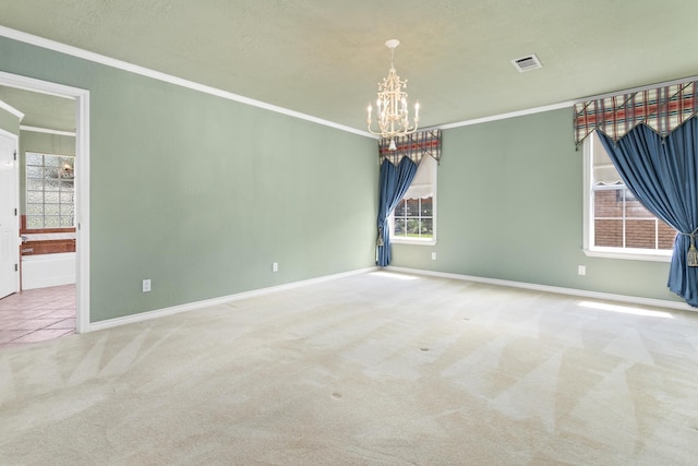 3590 Wheat Dr, Beaumont, TX 77706 - spare room with crown molding, carpet floors, a chandelier, and healthy amount of natural light