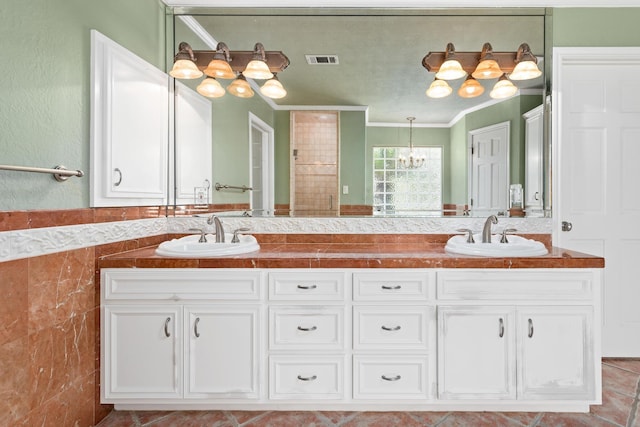 3590 Wheat Dr, Beaumont, TX 77706 - full bathroom with a chandelier, double vanity, crown molding, and a shower