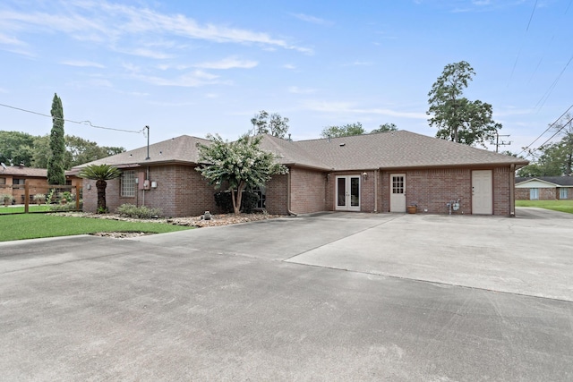 3590 Wheat Dr, Beaumont, TX 77706 - ranch-style home with brick siding and french doors