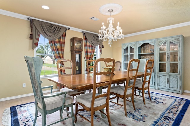 3590 Wheat Dr, Beaumont, TX 77706 - dining space with a chandelier, crown molding, and tile patterned flooring