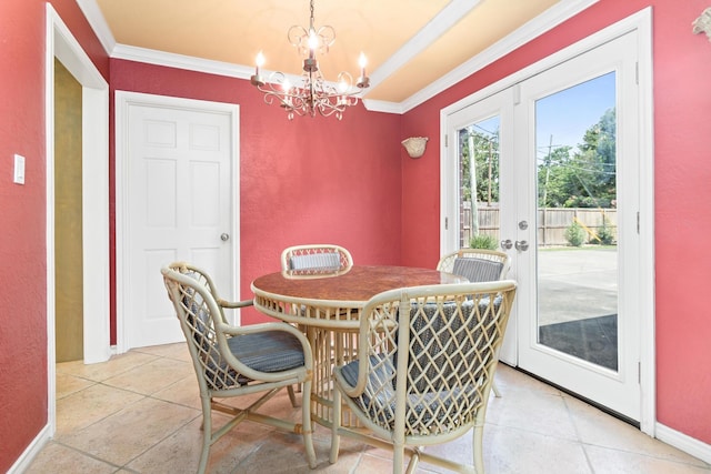 3590 Wheat Dr, Beaumont, TX 77706 - dining space with crown molding, a chandelier, and french doors