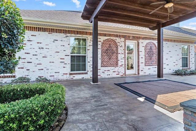 view of patio with ceiling fan