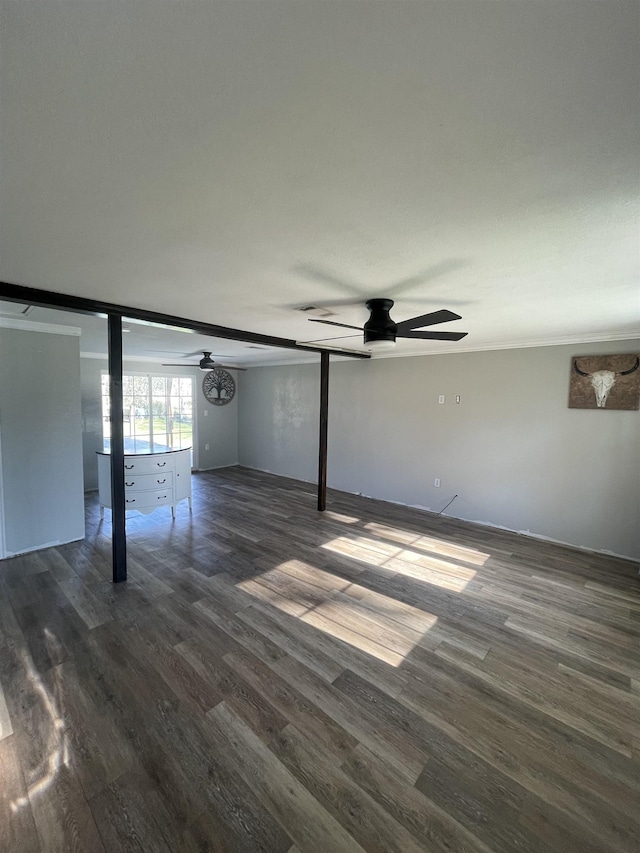 interior space featuring dark wood-style floors and a ceiling fan