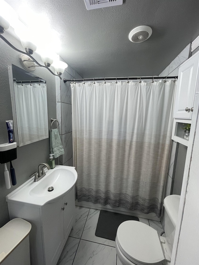 full bathroom featuring visible vents, toilet, shower / tub combo with curtain, marble finish floor, and a textured ceiling