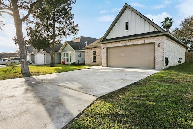 view of front of home featuring a garage and a front yard