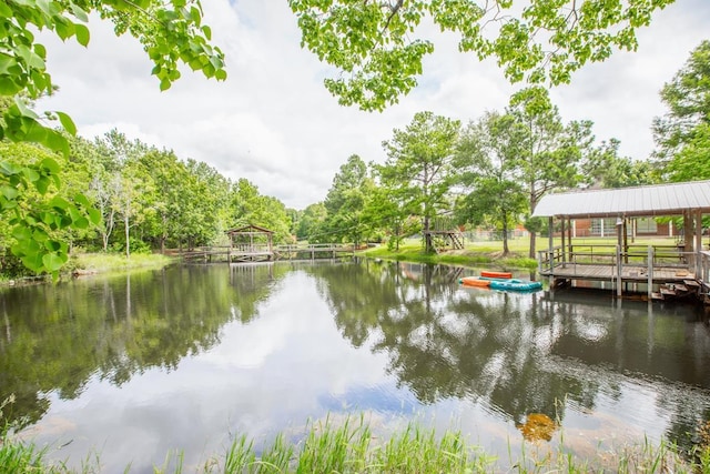 dock area featuring a water view