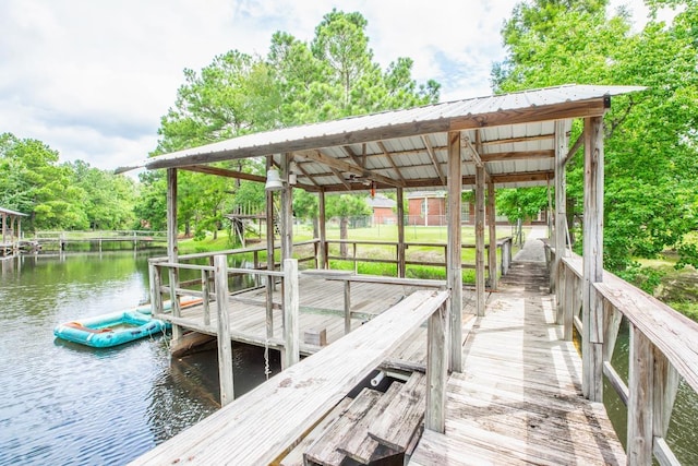 view of dock with a water view