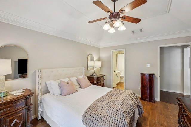 bedroom featuring visible vents, wood finished floors, ceiling fan, crown molding, and connected bathroom