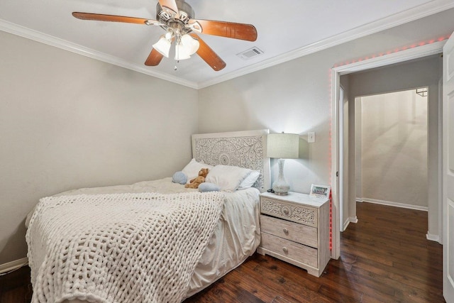 bedroom with visible vents, dark wood-type flooring, crown molding, baseboards, and ceiling fan