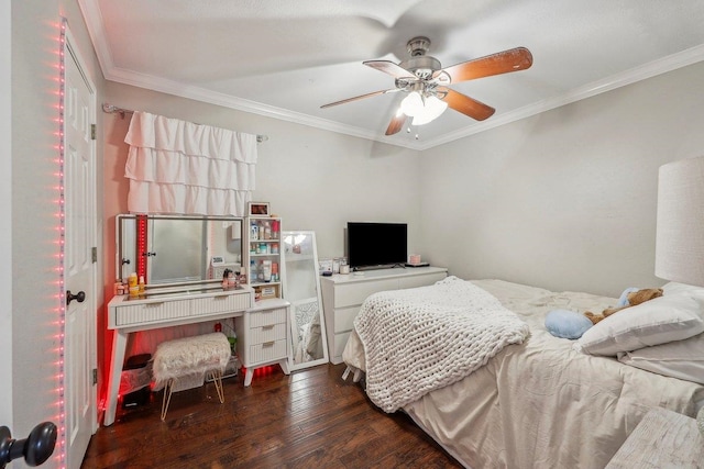 bedroom featuring ceiling fan, ornamental molding, and wood-type flooring