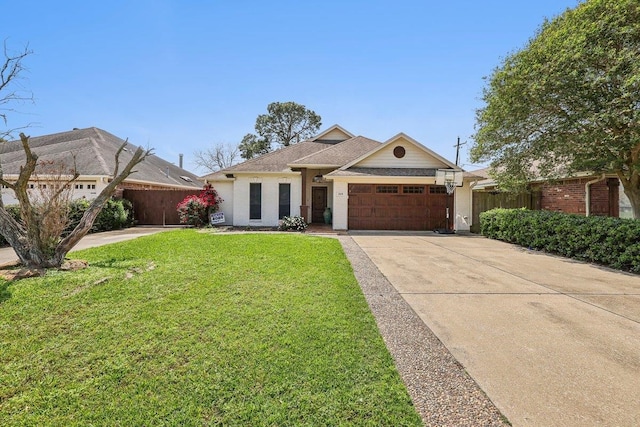 single story home featuring fence, concrete driveway, a front yard, and a garage