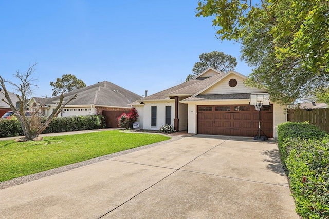 single story home with a garage, driveway, a front lawn, and fence