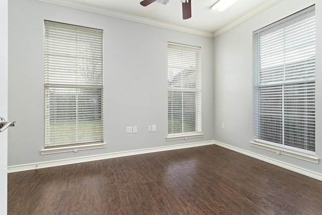 empty room with ornamental molding, hardwood / wood-style floors, and ceiling fan