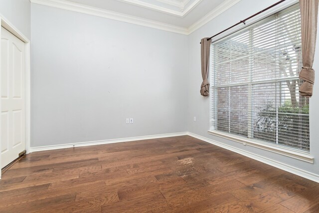 unfurnished living room with crown molding, a fireplace, and hardwood / wood-style floors