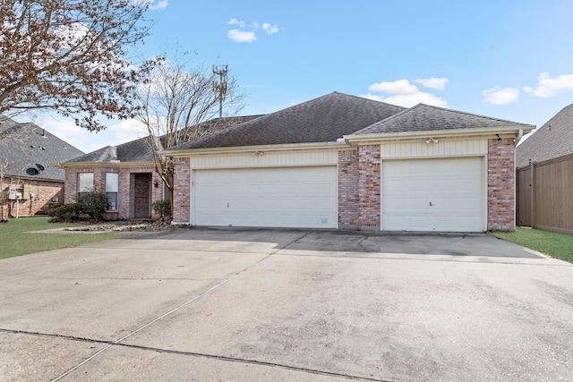 single story home with a garage