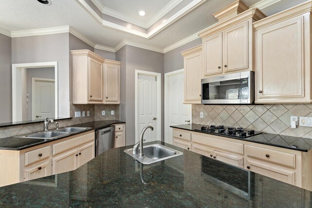 bathroom with tile patterned floors, a shower with door, vanity, and ornamental molding