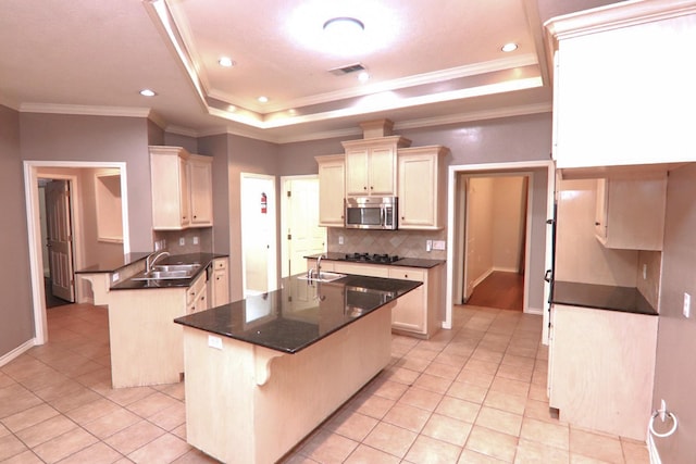 kitchen with kitchen peninsula, a breakfast bar, light tile patterned floors, and ornamental molding