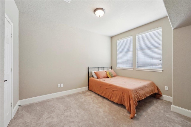 10375 Dominion Ct, Port Arthur, TX 77640 - bedroom with light carpet and baseboards